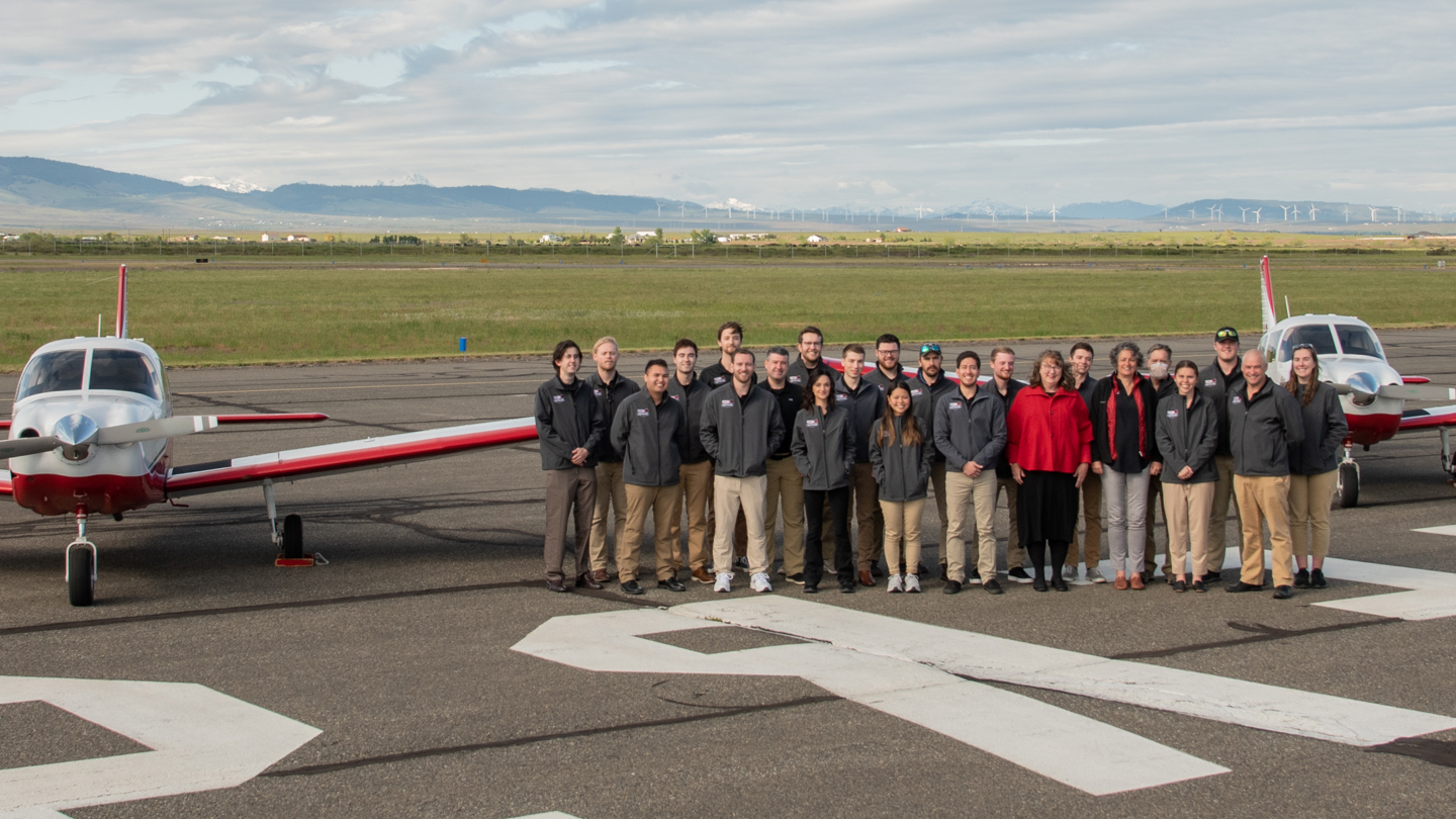 A large group of students and Staff that partake in the aviation program at central washington university