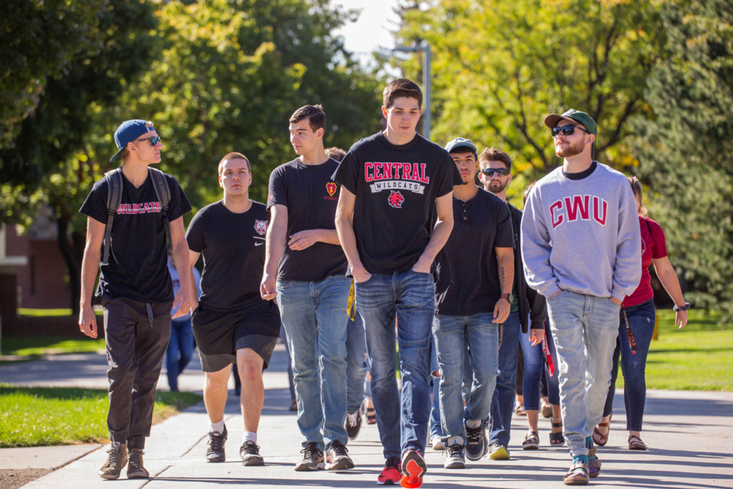 A group of students take a walk through Central Washington University.
