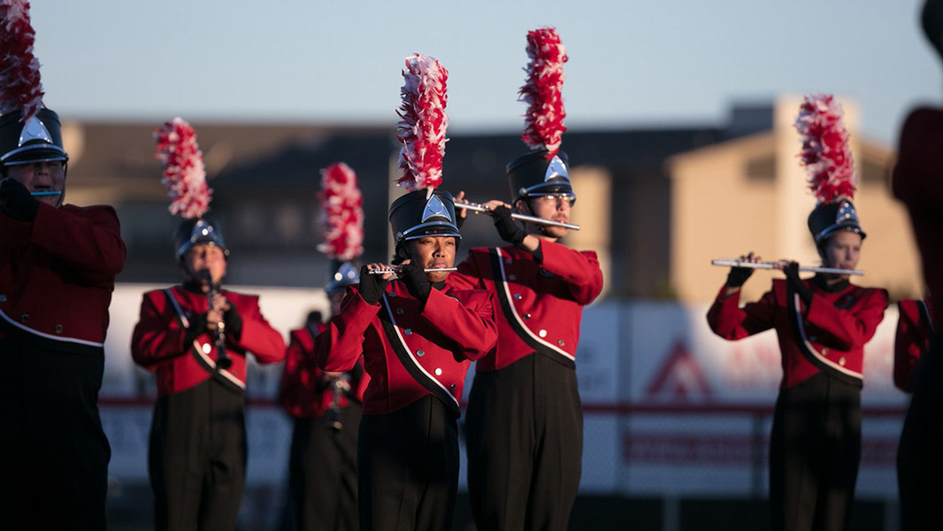 Members of the Central Washington University marching band lay their instruments at Tomlinson Stadium.