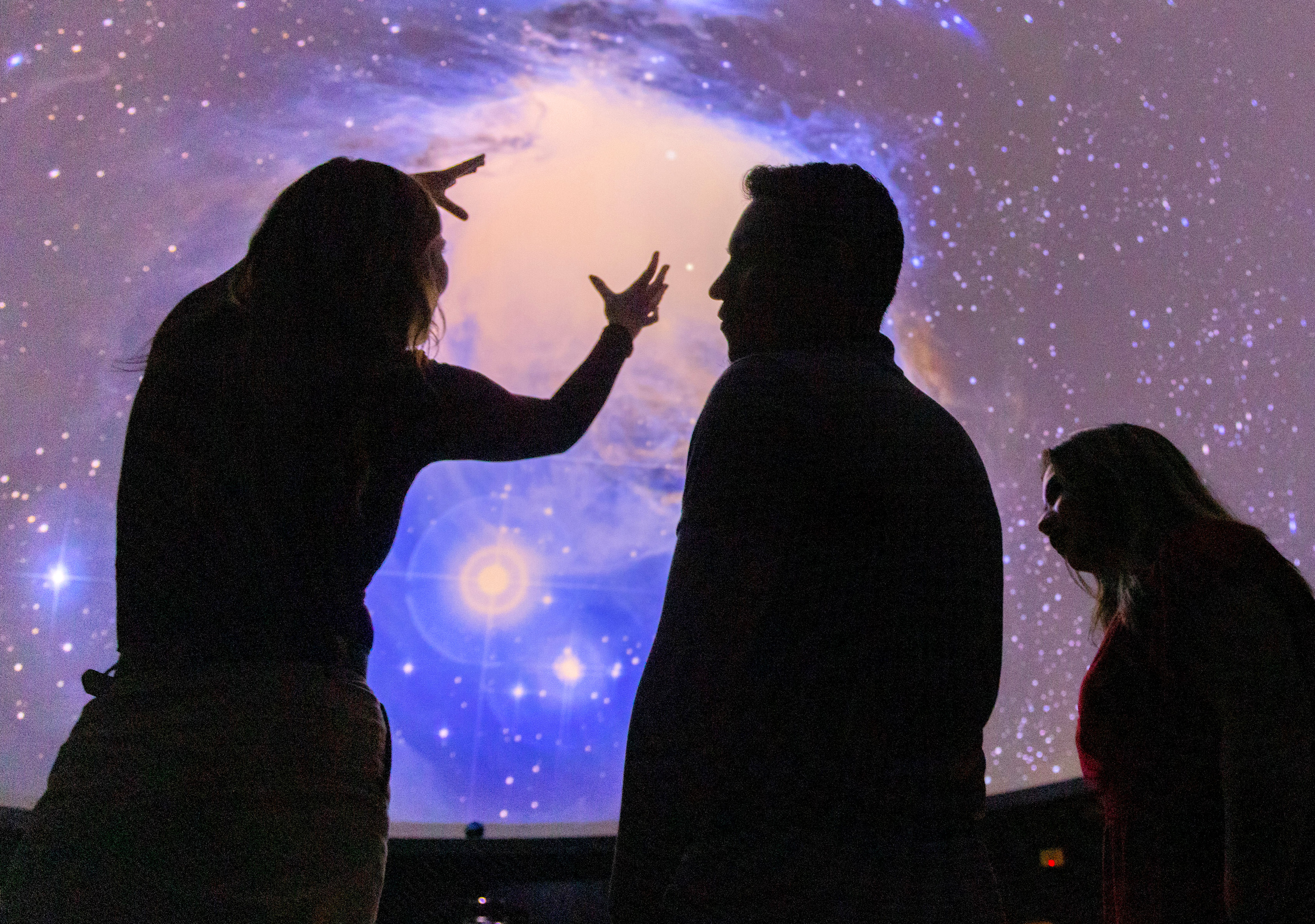 students and professors in the astronomy lab