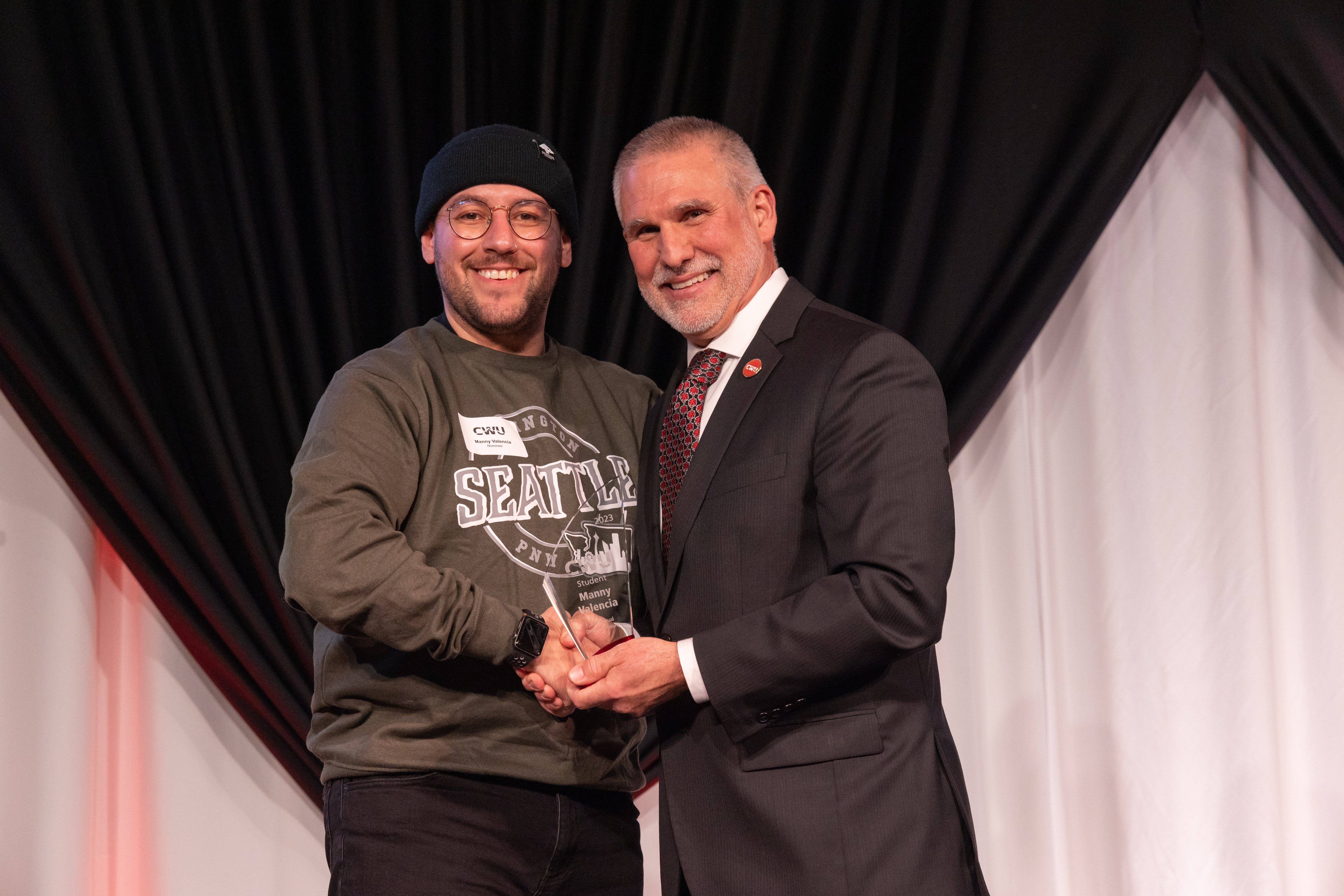 Manny accepts an award at the 2023 Diversity Awards