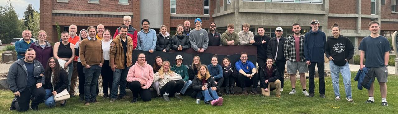 Photo of CWU and Plymouth students on the lawn at Dean Hall