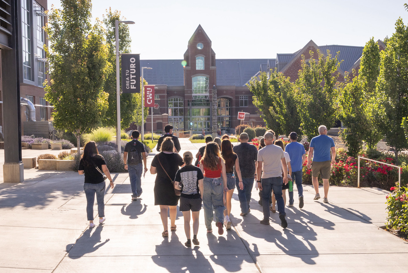 Students walk on campus during orientation