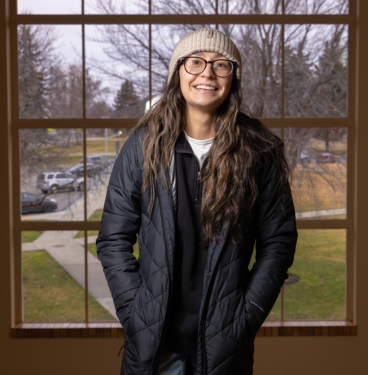 CWU senior Alyssa Castilla stands on the stairwell in Hebeler Hall.