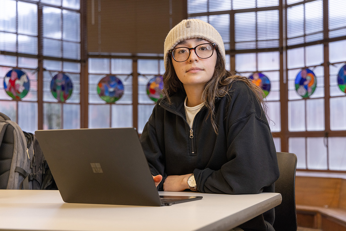 Alyssa Castilla works in the McNair Room in Hebeler Hall.