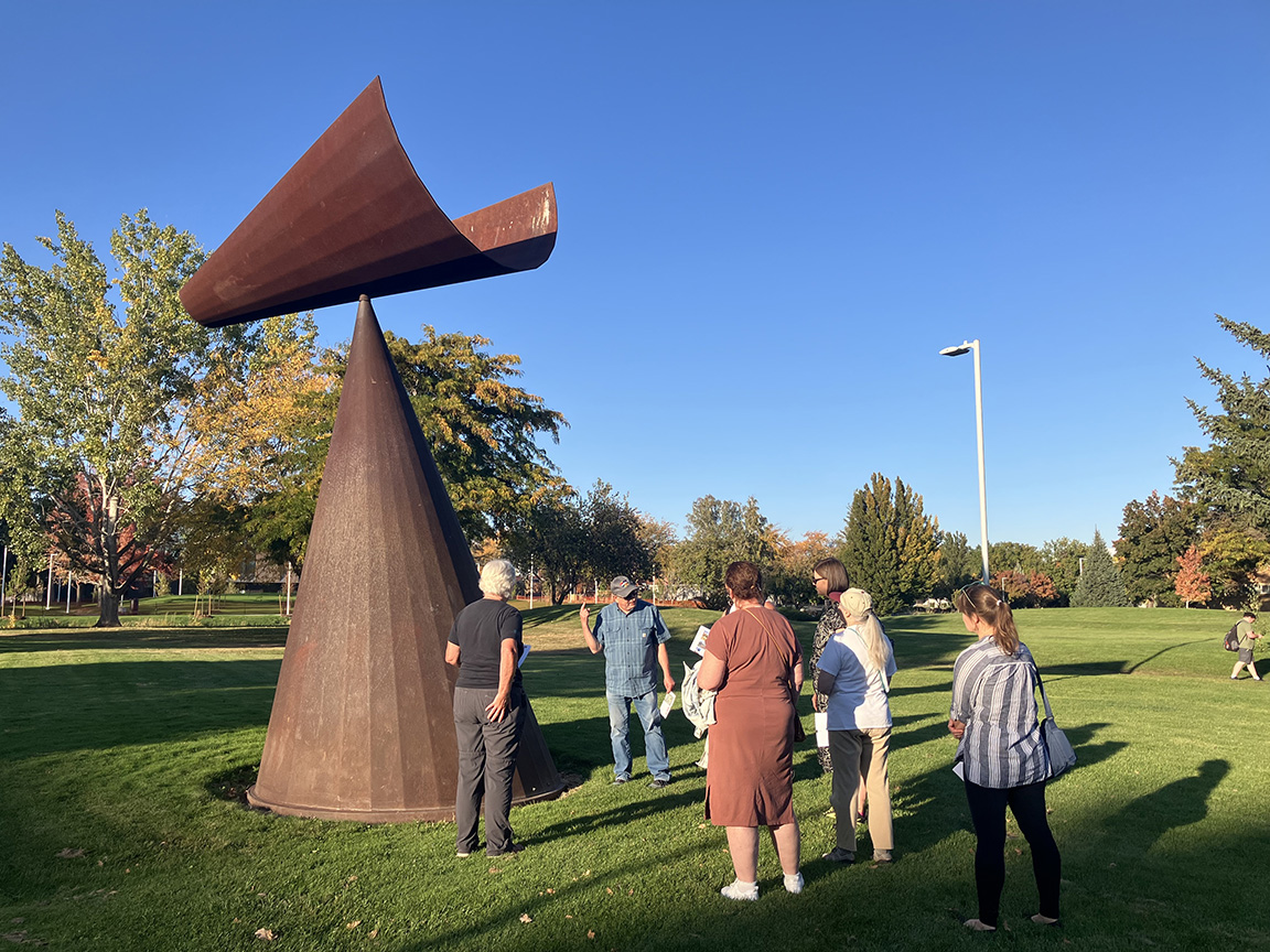 A CWU arts professor takes guests on a tour of campus
