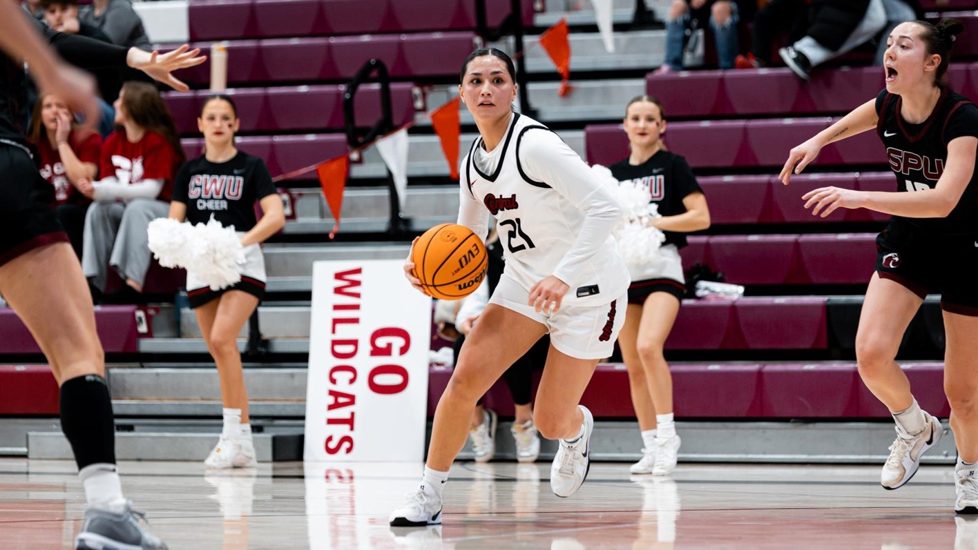 CWU senior Asher Cai dribbles the ball up court