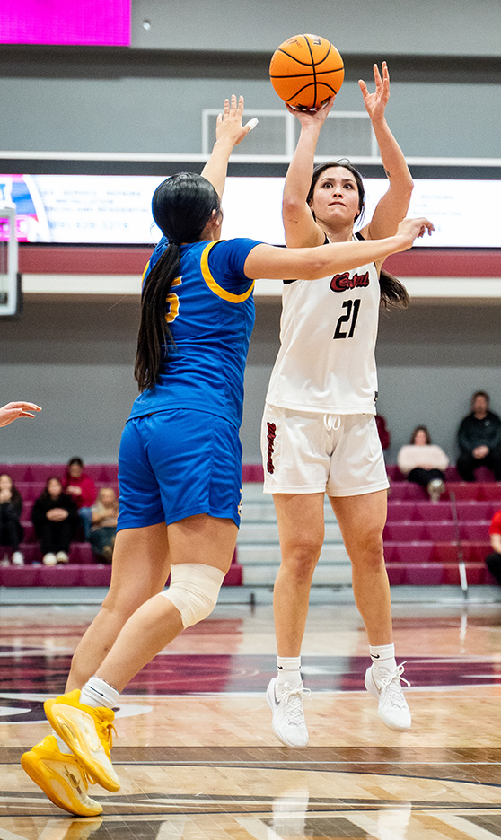 Asher Cai takes a shot during a recent game