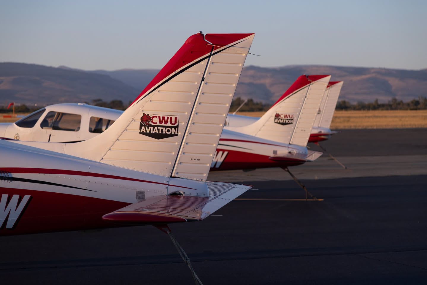 Planes sit on the runway at Bowers Field