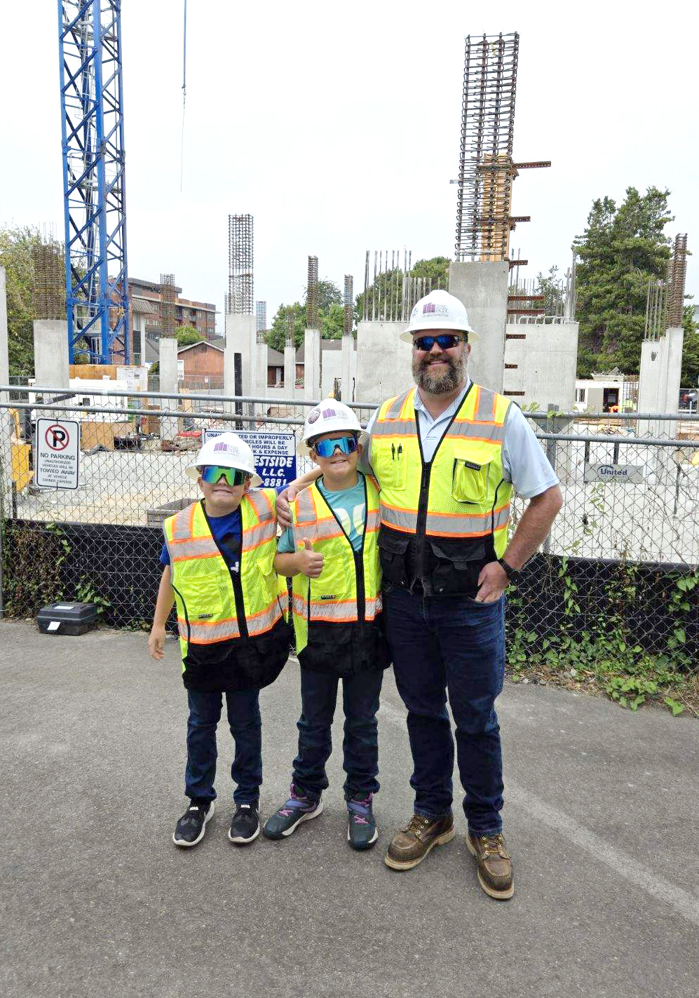 Brian Sorensen and his kids at a construction site