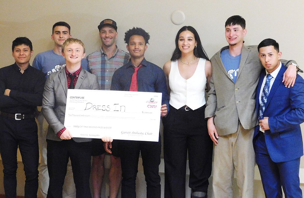 Cat Tank second-place winners Cole Smith and Young Idow with the Cat Tank student team.