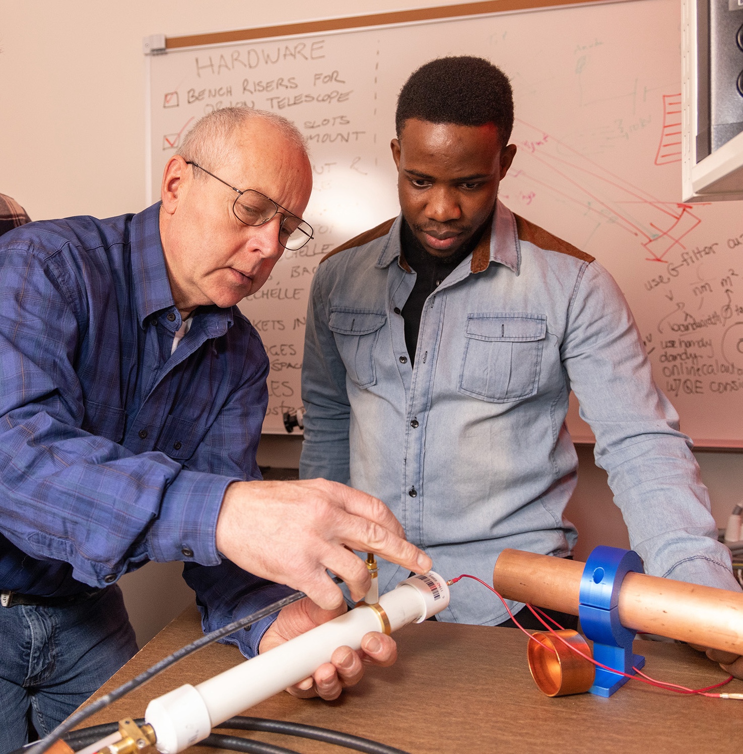 Christian Laurent works alongside Professor Peter Zencak in the lab.