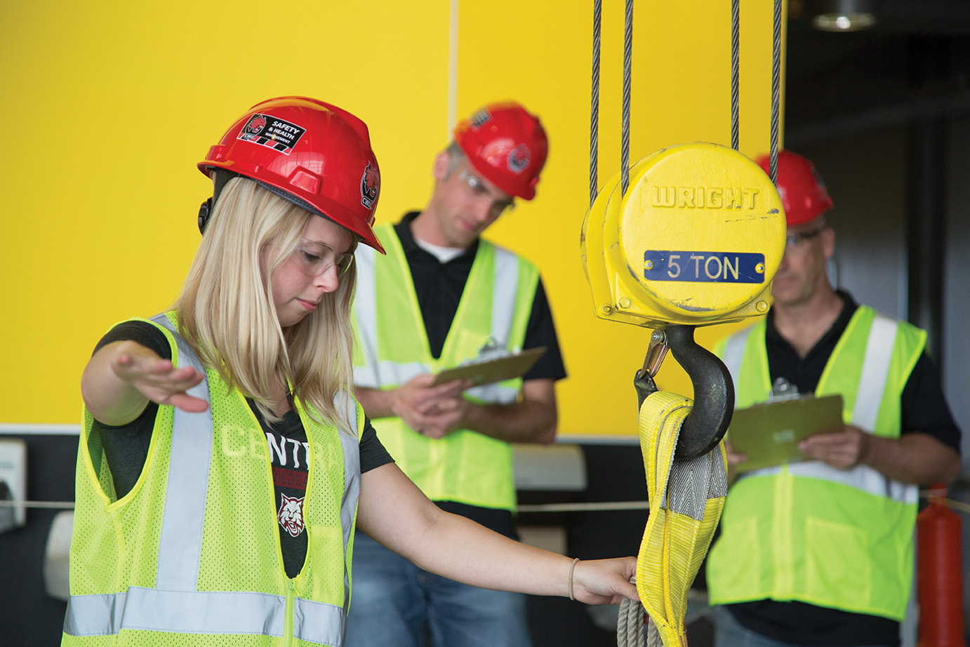 A female CMGT student practices her safety skills