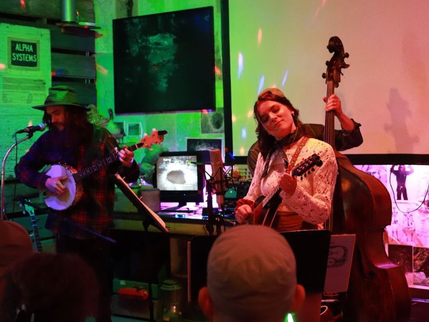 Perron performing with her band Tinned Fish