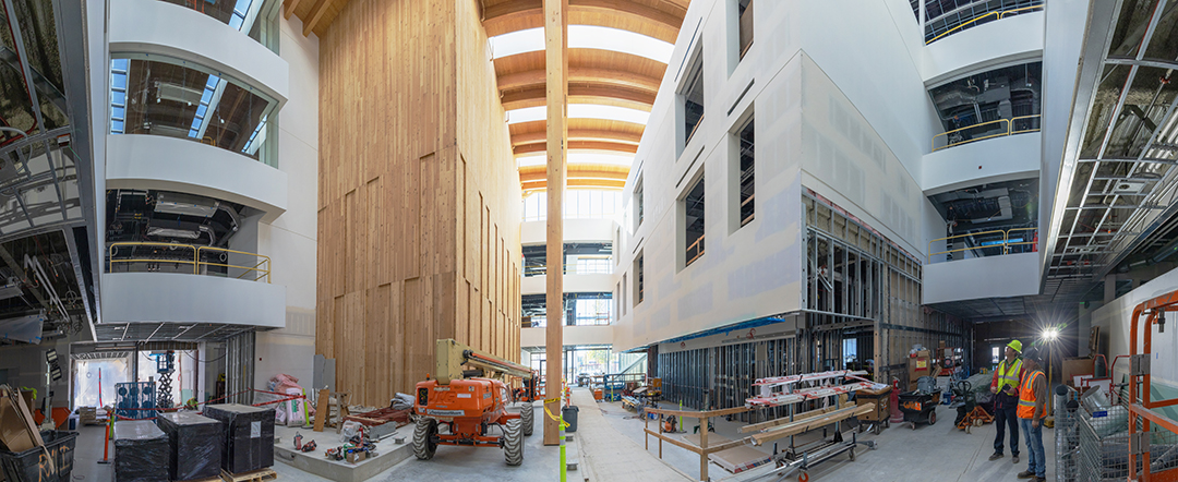 A panoramic view of the inside of the NAC, featuring a big wooden wall.
