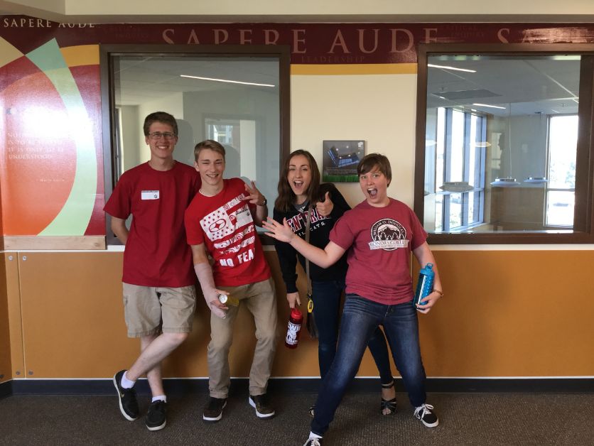 Students looking happy in DHC logowear