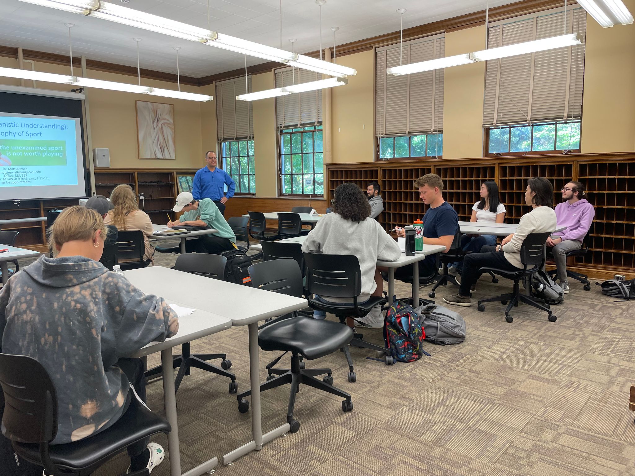 A DHC classroom full of lively discussion