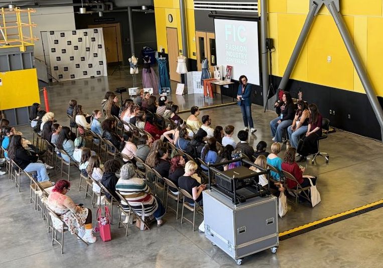 Students, staff and faculty gather in Hogue Hall for the Fashion Industry Conference
