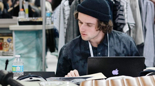 An Apparel, Textiles and Marketing student works on a project.