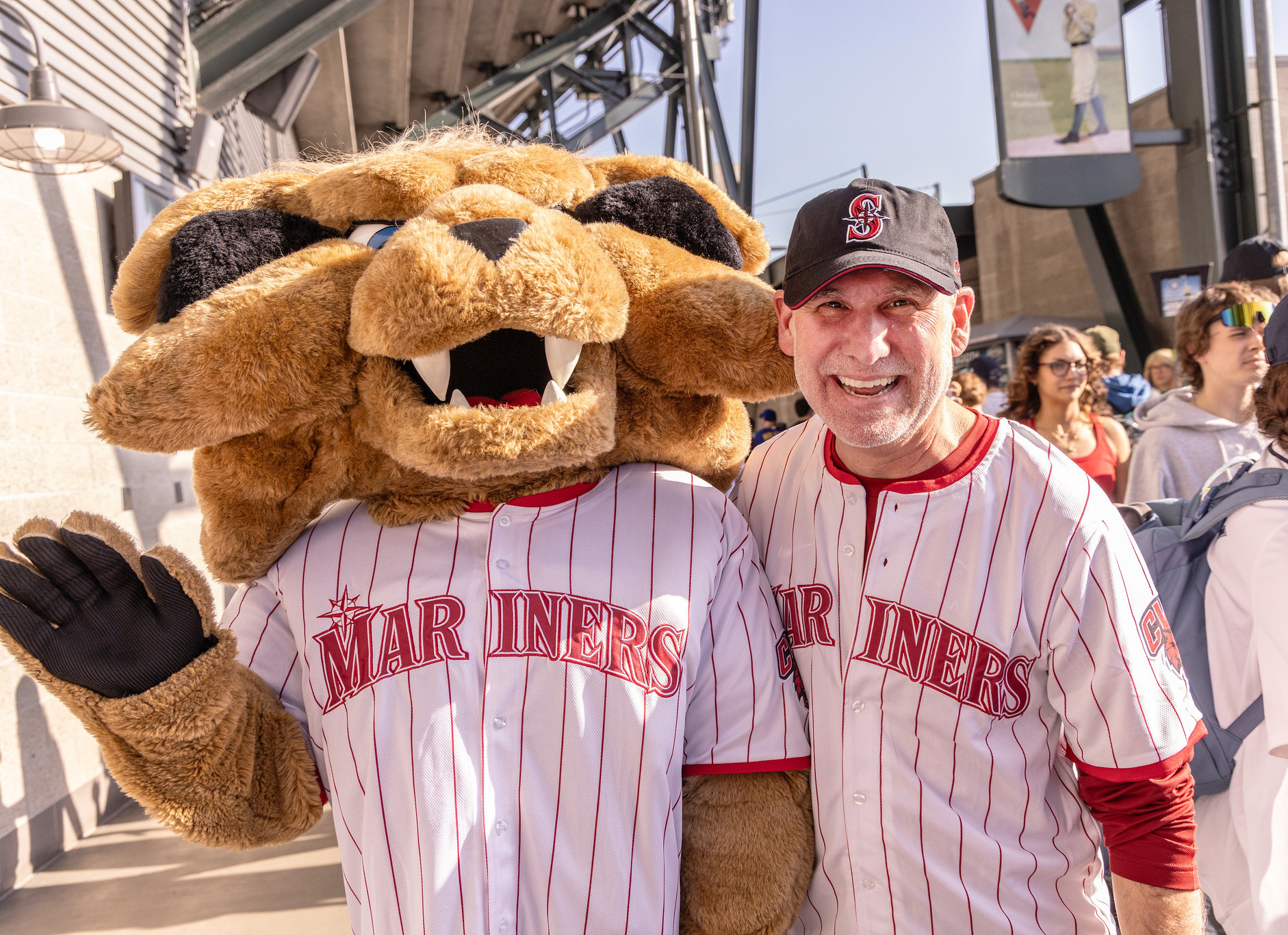 President Jim Wohlpart poses with Wellington Wildcat at the ballpark