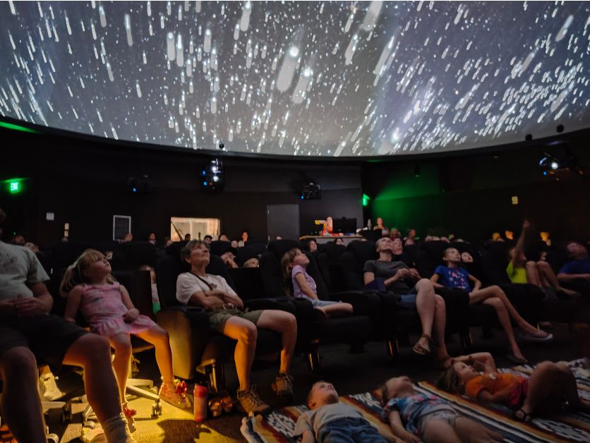 Visitors zoom through space.