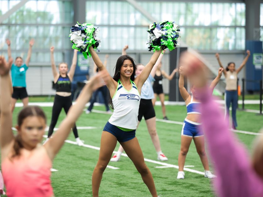 Presley DeJesus strikes a pose at a Seahawks camp.