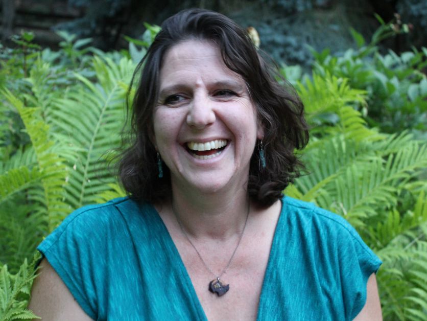 Maya Jewell Zeller surrounded by ferns