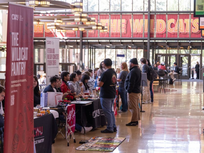 A large gathering of people at the Direct the Dollars event.