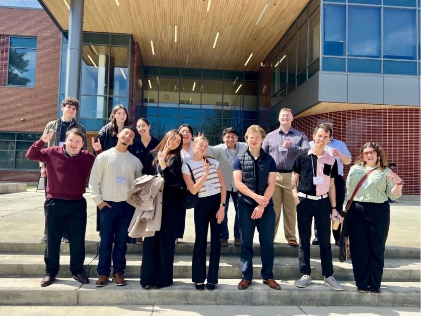 The CWU SHRM chapter poses in front of Samuelson hall.