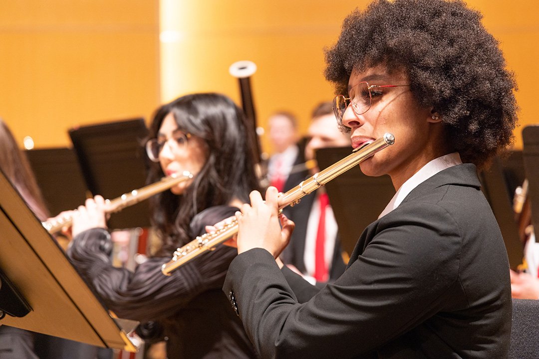 Flautists perform with the CWU Wind Ensemble