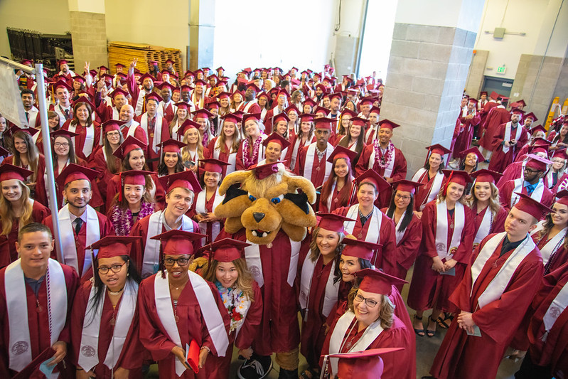 Group photo of CWU graduates at the Des Moines center