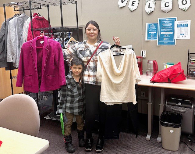 A CWU-Yakima student shows off her new clothing