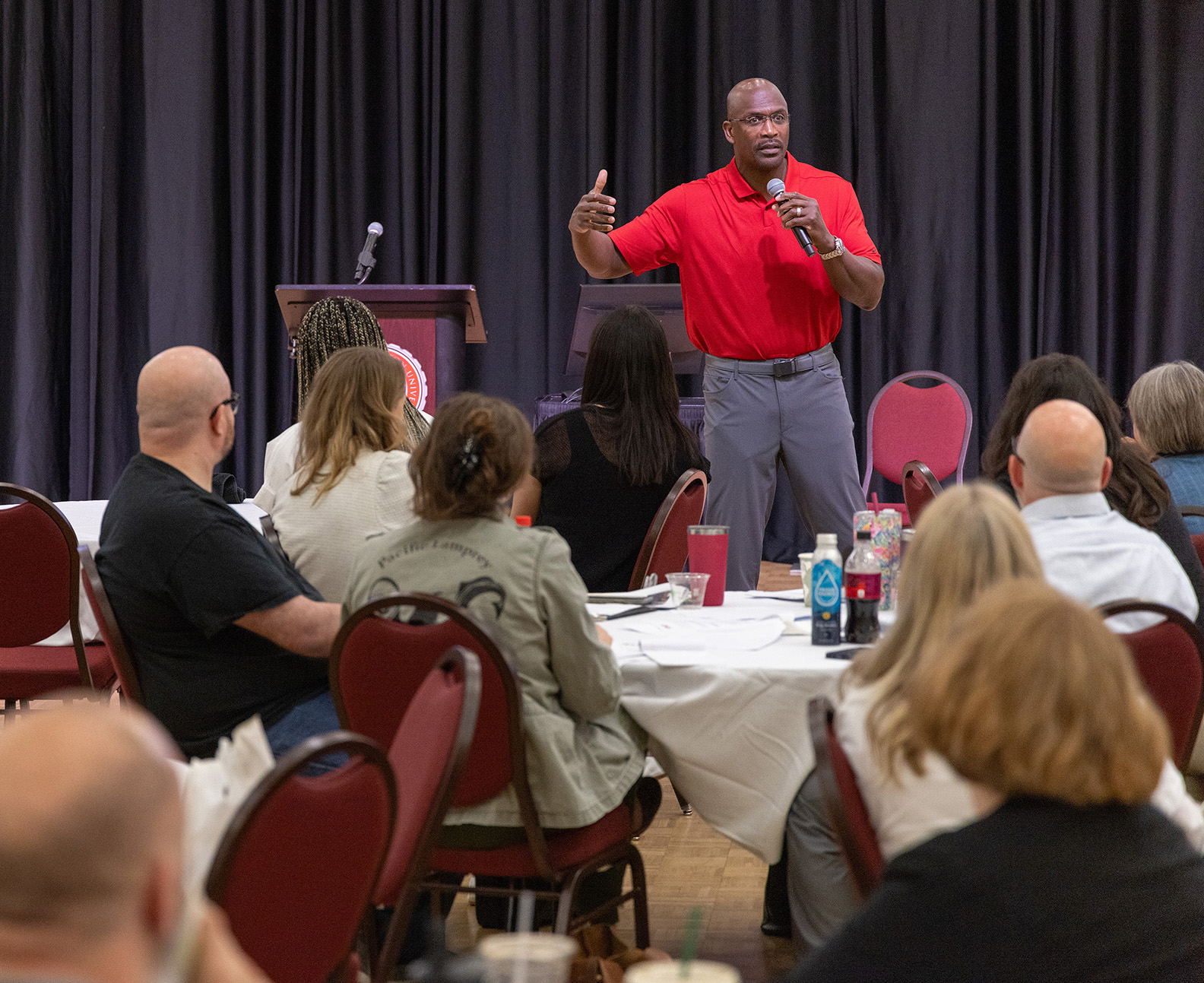 CWU alumnus Eric Boles speaks at the June 12 Supervisor Summit