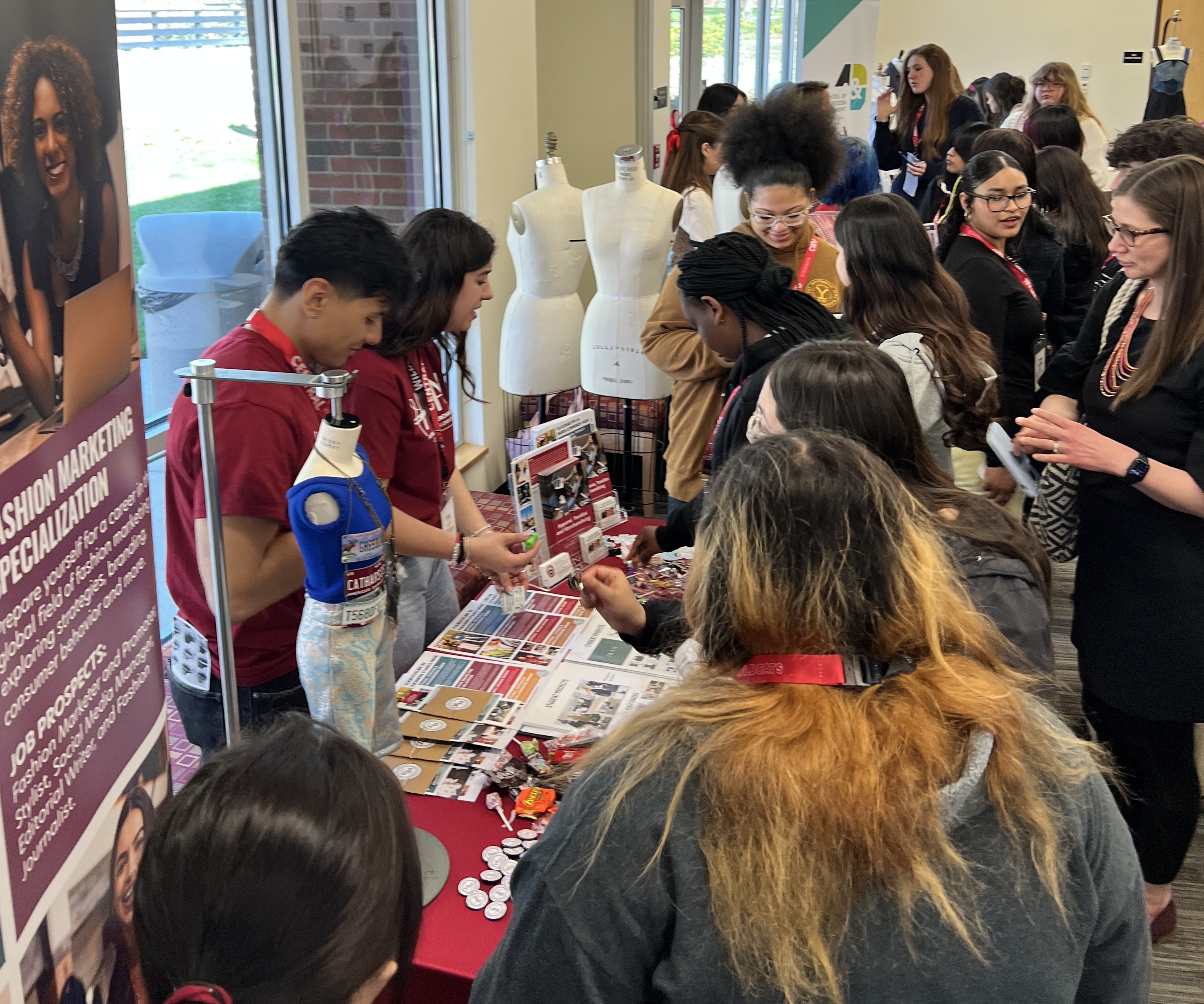 Students and guests gather during the Fashion Industry Conference