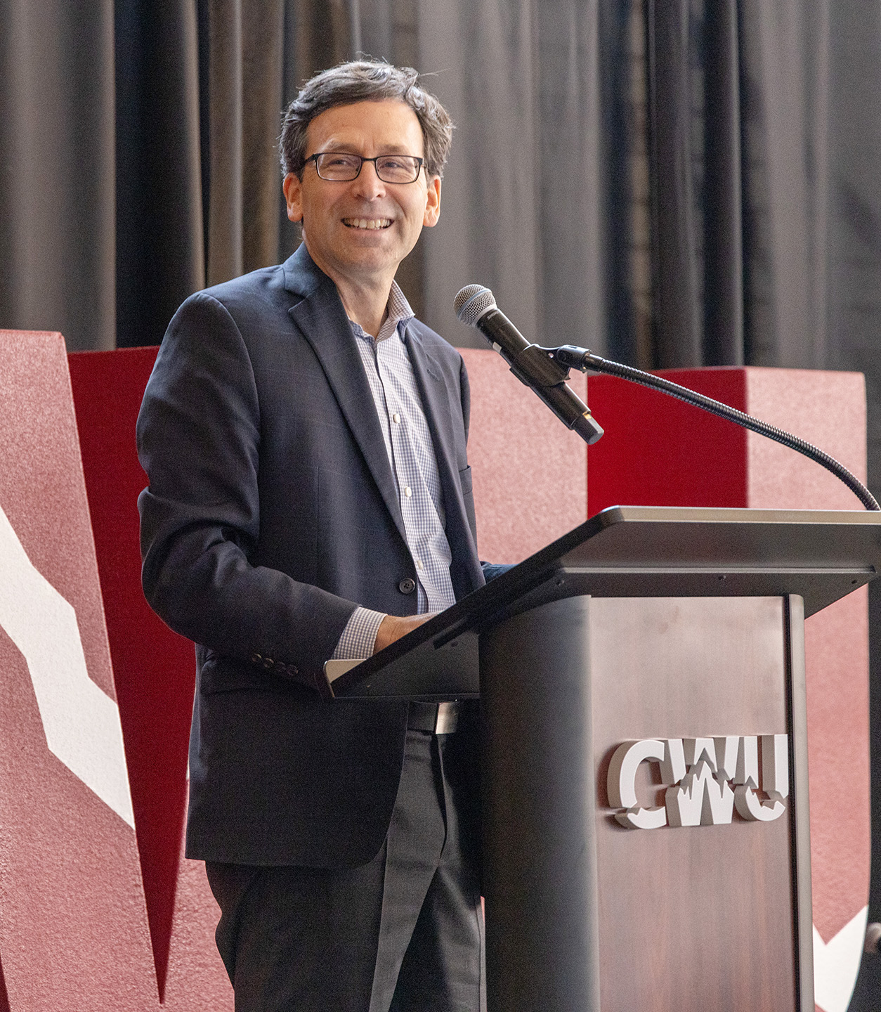 Governor Bob Ferguson at the podium