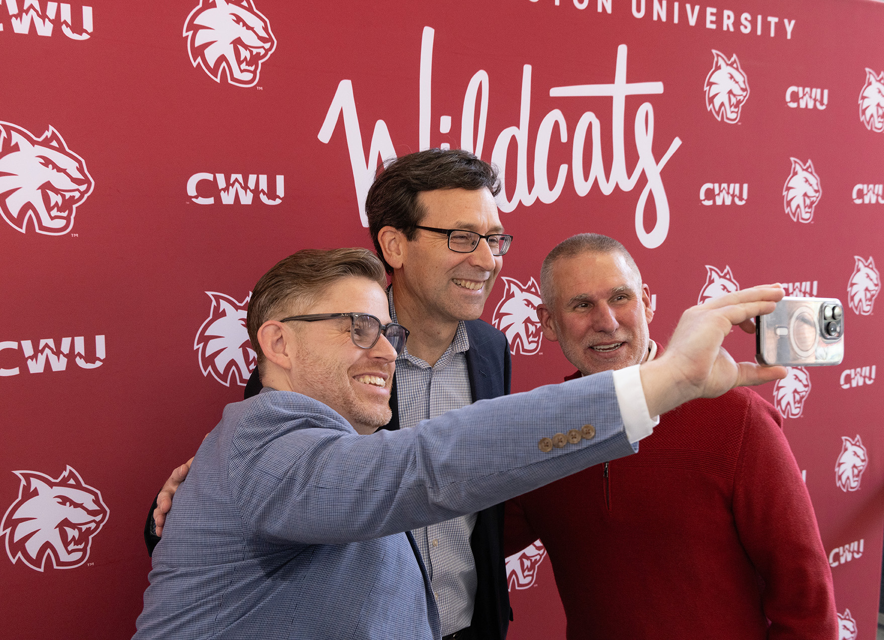 VP of University Relations Andrew Morse and President Wohlpart take a selfie with Governor Ferguson