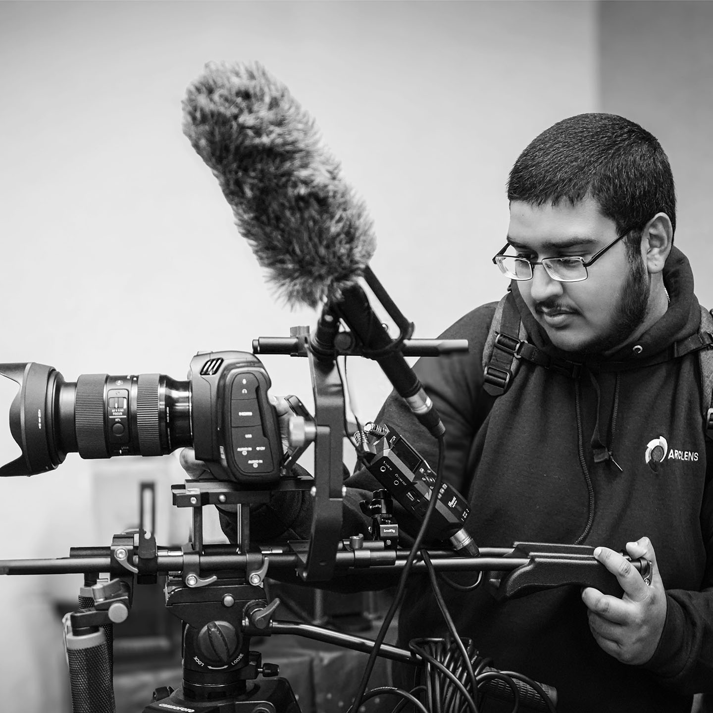 Gurdil Dardi holding a camera