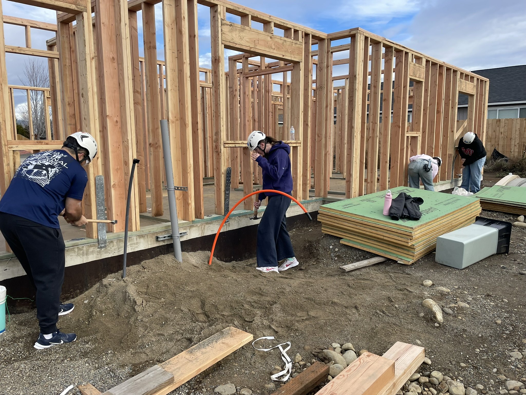 HFH volunteers work on the Stuart Meadows site in Ellensburg