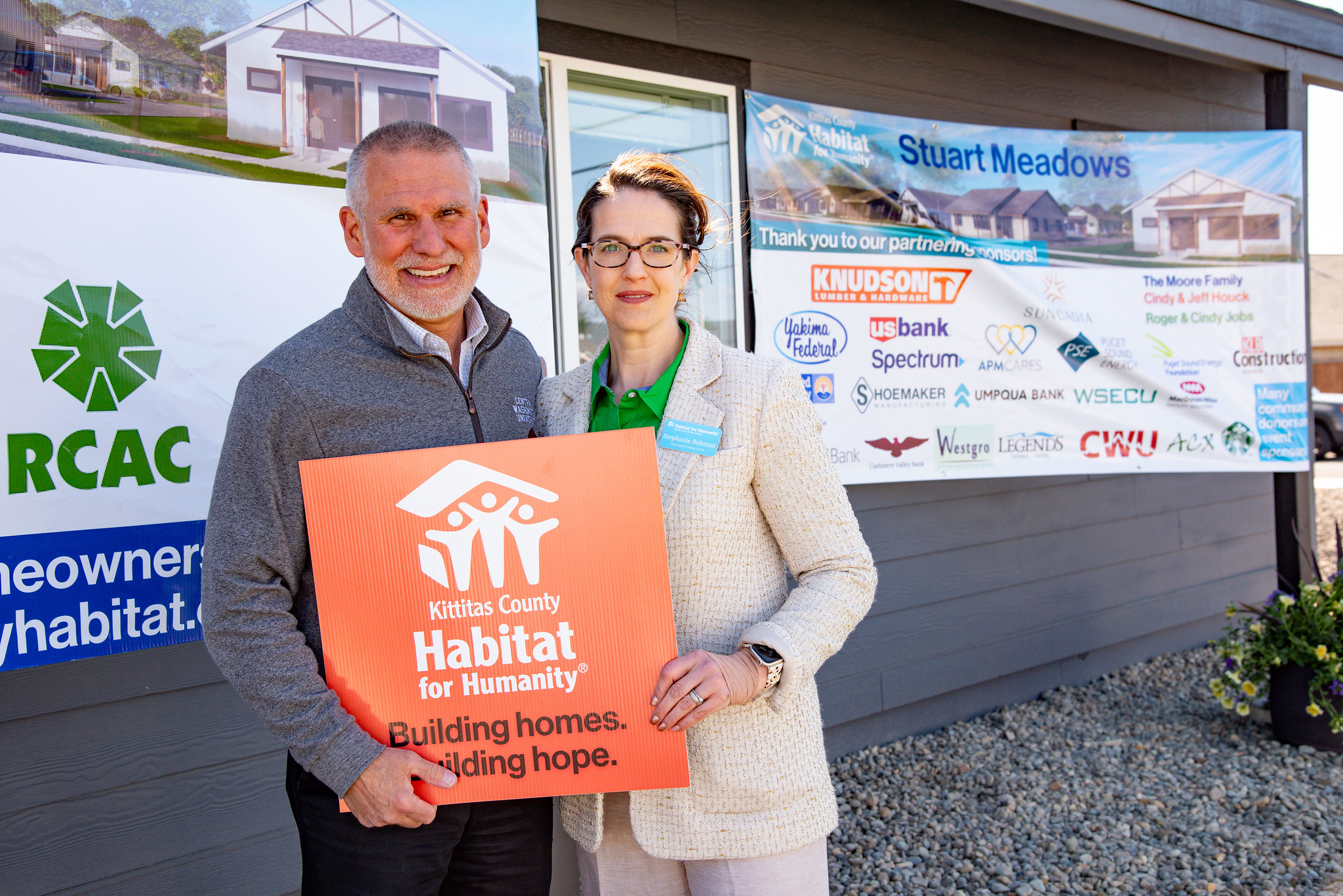 CWU President Jim Wohlpart and Habitat for Humanity Area Director Stephanie Bohman 