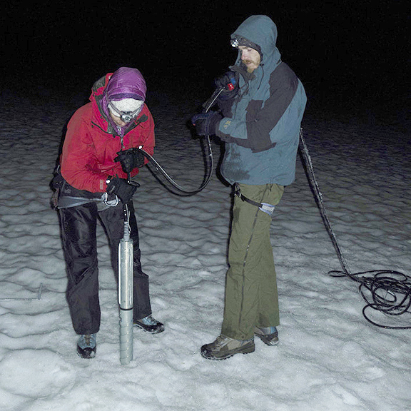 Kaspari and previous CWU Master of Science student Dan Pittenger, the journal article’s co-author, drill a shallow ice  core on South Cascade Glacier in 2014.