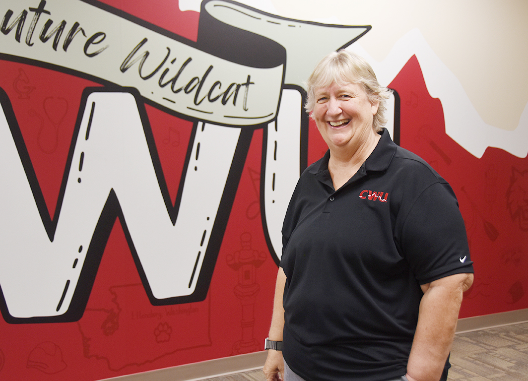 JoAnn Page smiles in the CWU Admissions office