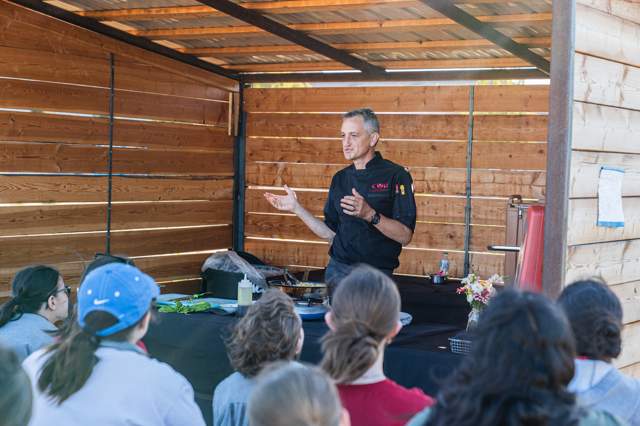 Campus Executive Chef Joe Ritchie delivers a food demonstration at The Farm.