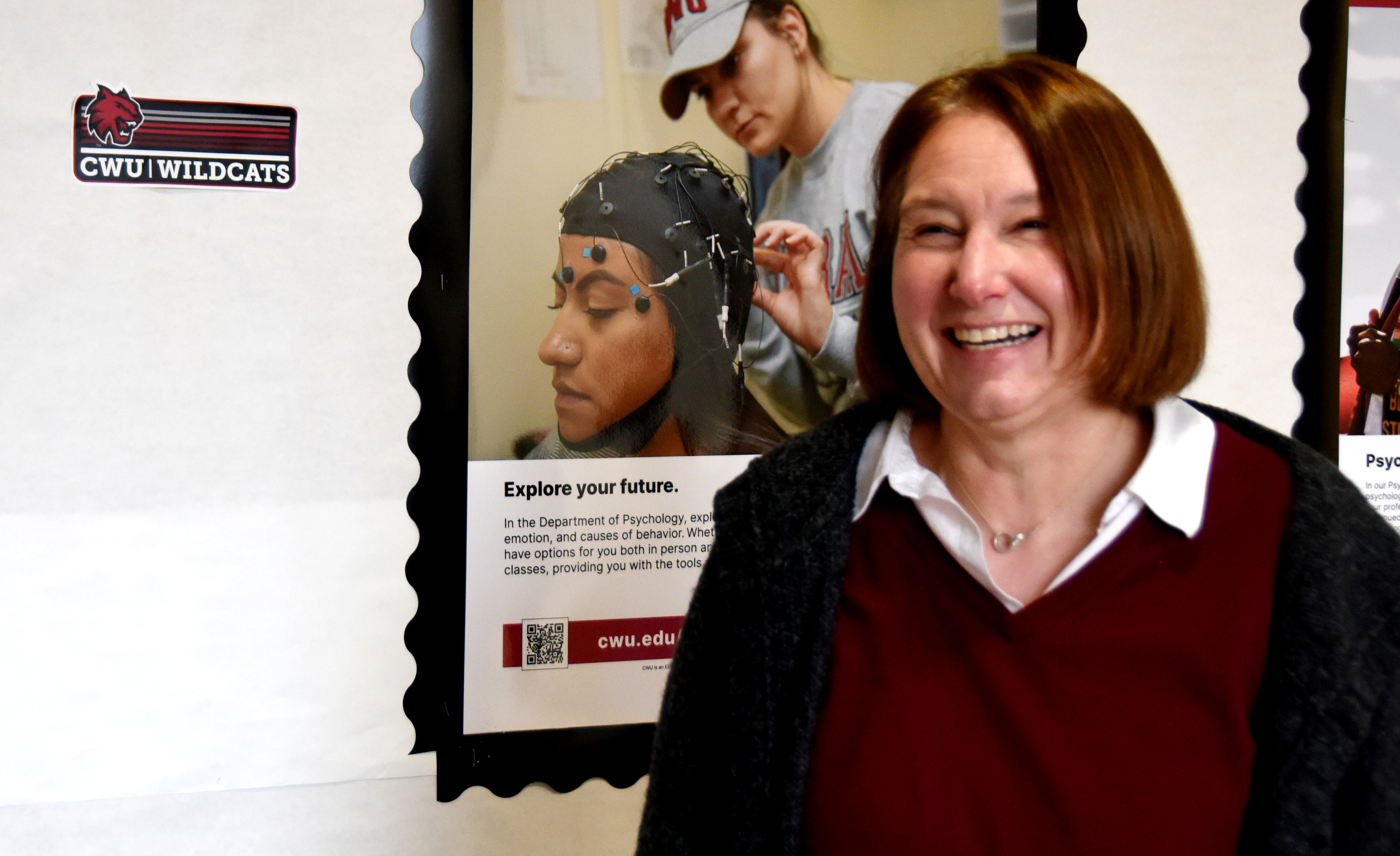 Kara Gabriel smiles in her office on the CWU campus