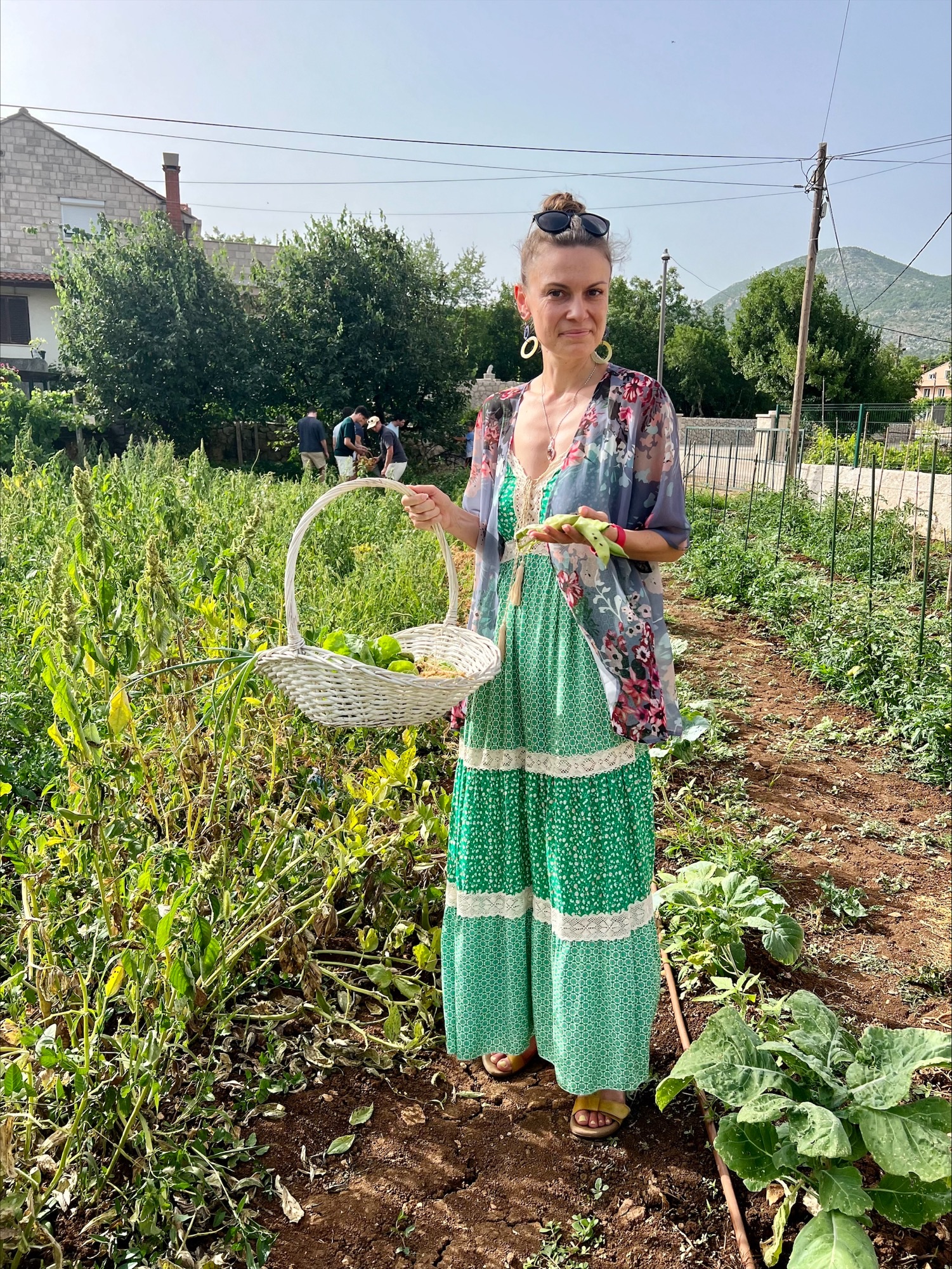 Mary Eberhardinger standing in a field in Croatia