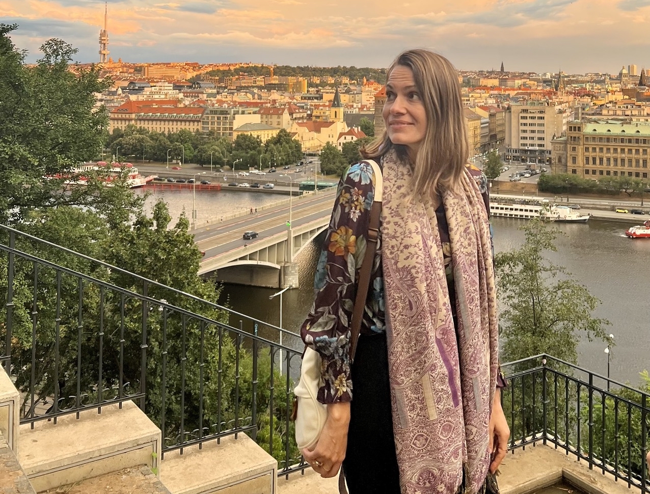Mary Eberhardinger in front of a European vista