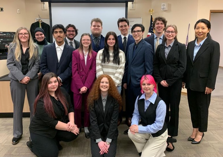 Group photo of the CWU Mock Trial Team in their competition suits and ties.