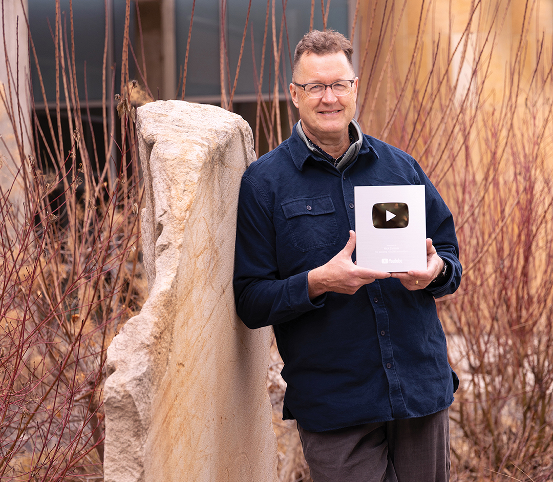 Photo of Nick Zentner with his Silver Creator Award from youtube