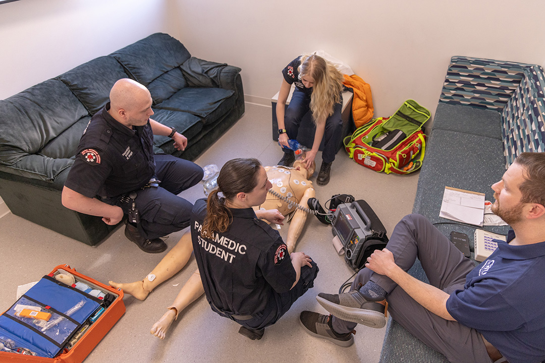 Paramedicine students train with their instructors