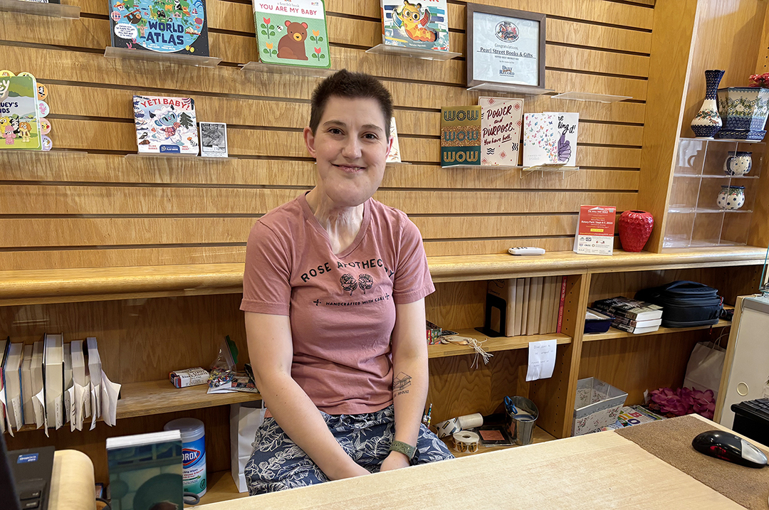 Pearl Street Books & Gifts owner Abby Alegria inside her downtown shop.