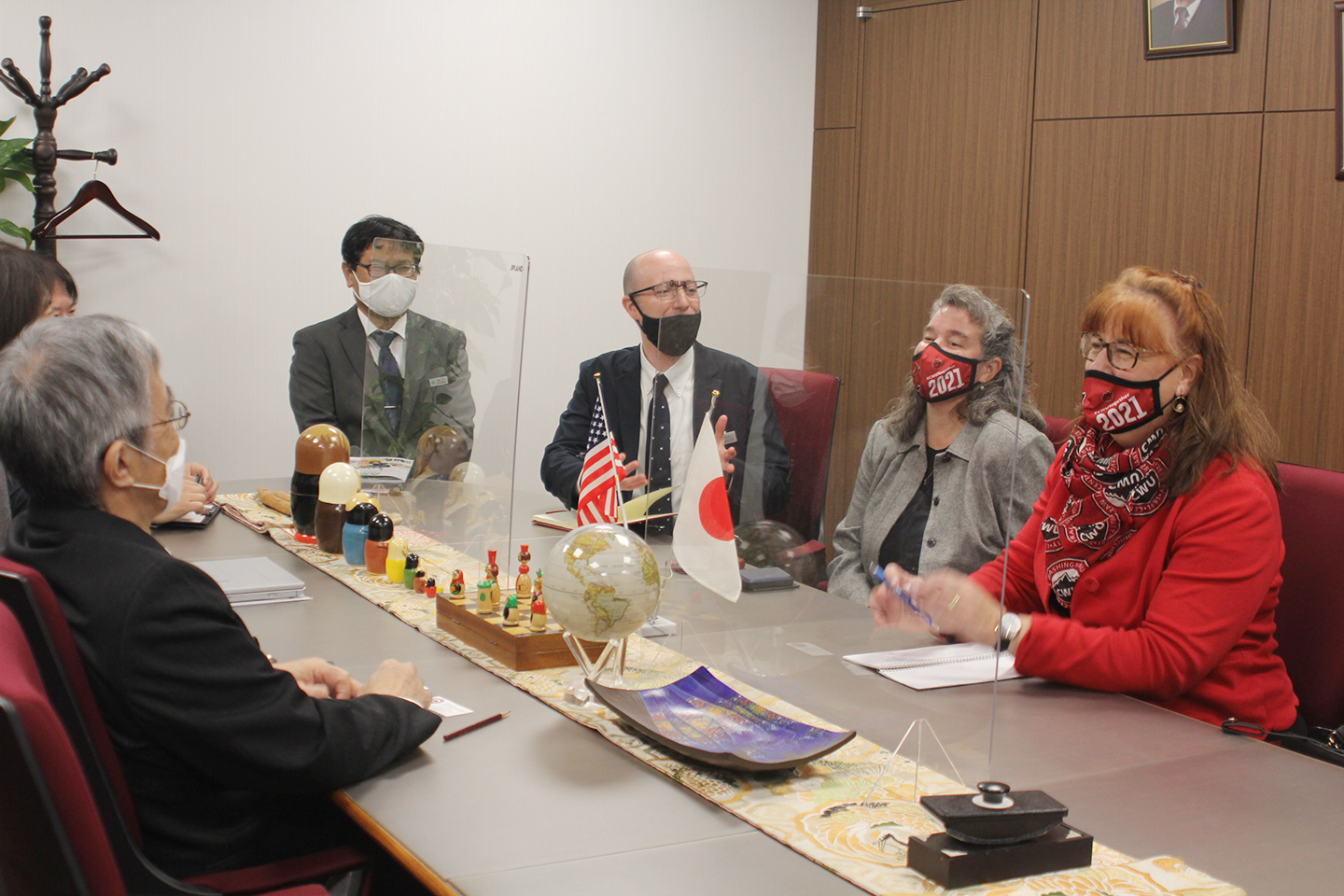 CWU Provost Michelle DenBeste, right, and AUAP Director Nicki Kukar meet with representatives from Asia University.